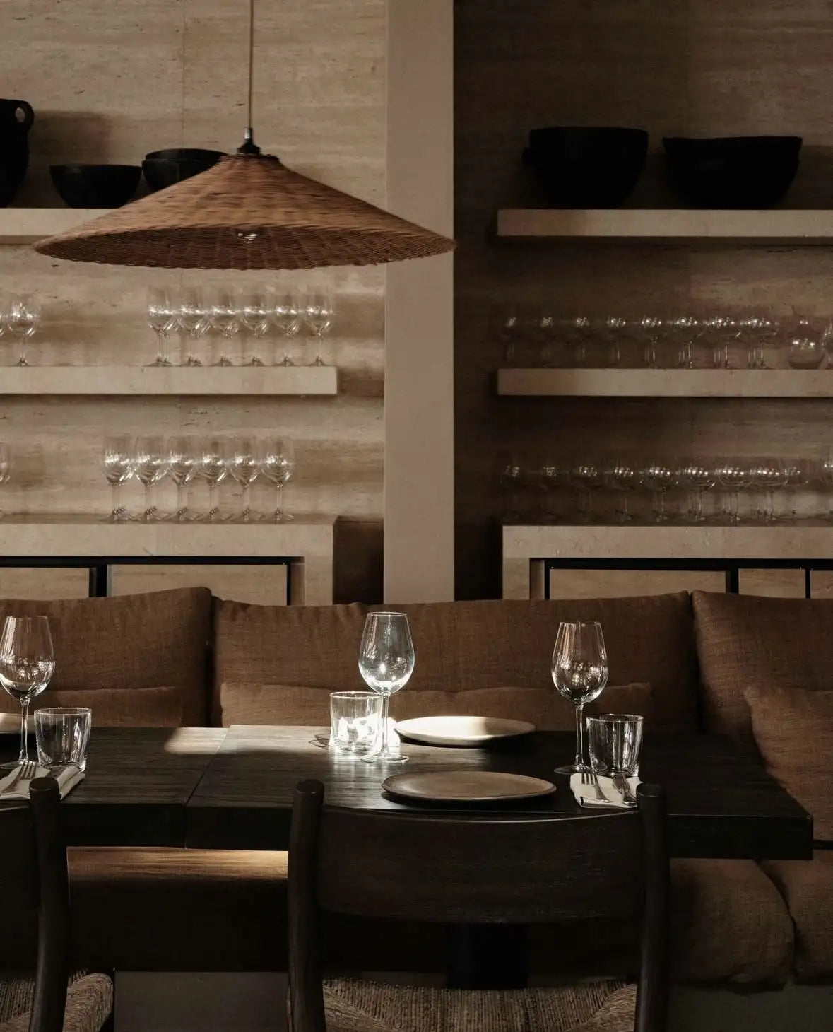 Woven wicker pendant light with a natural, earthy tone.